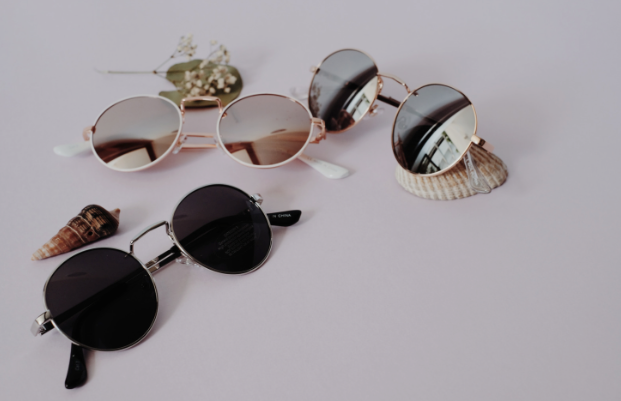three pairs of sunglasses in different sunglass lenses